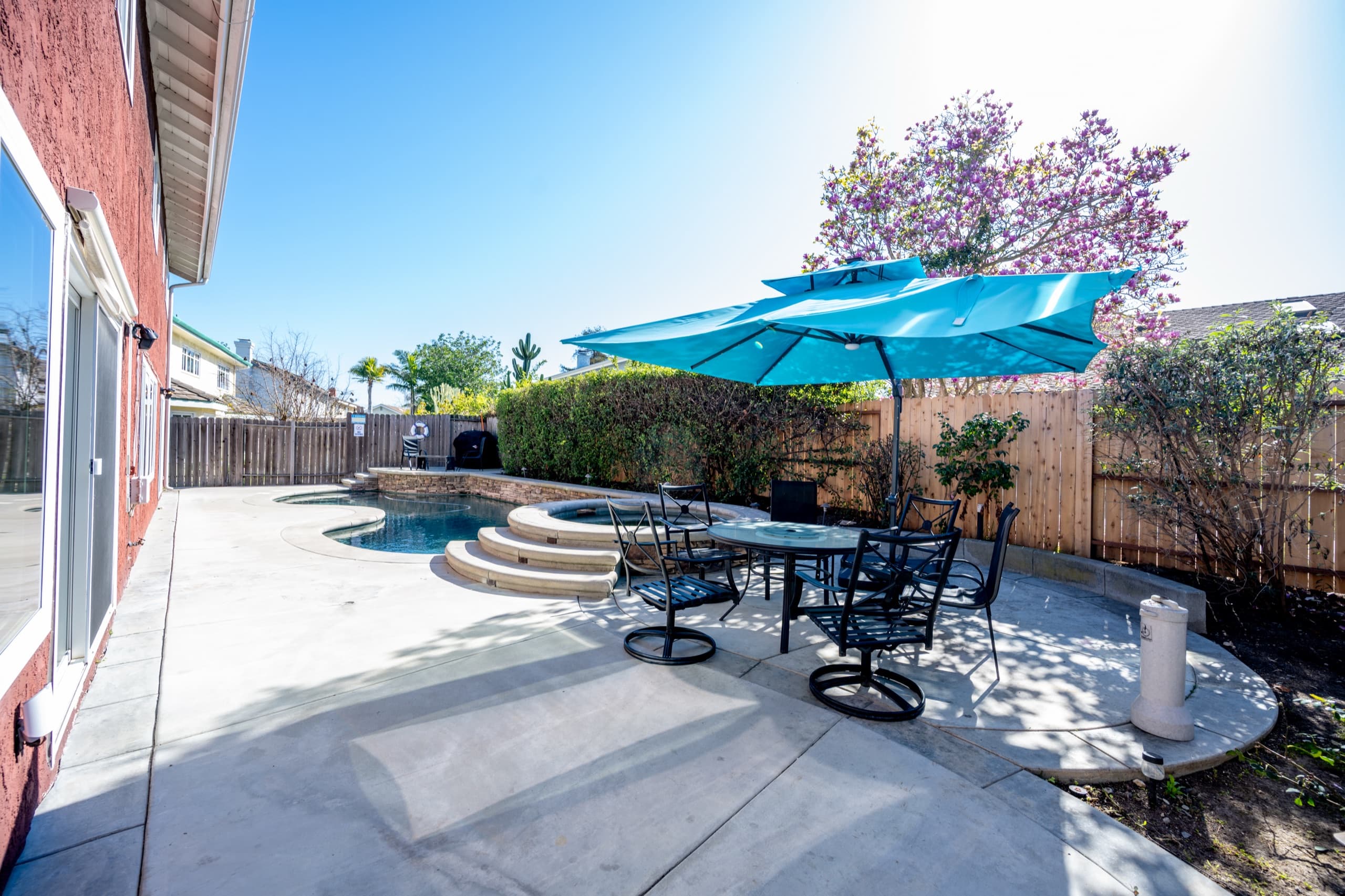 Shaded patio dining in the backyard